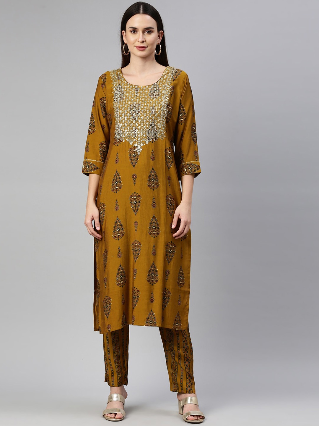 

Neerus Mustard Yellow Ethnic Motifs Yoke Design Kurta with Trousers