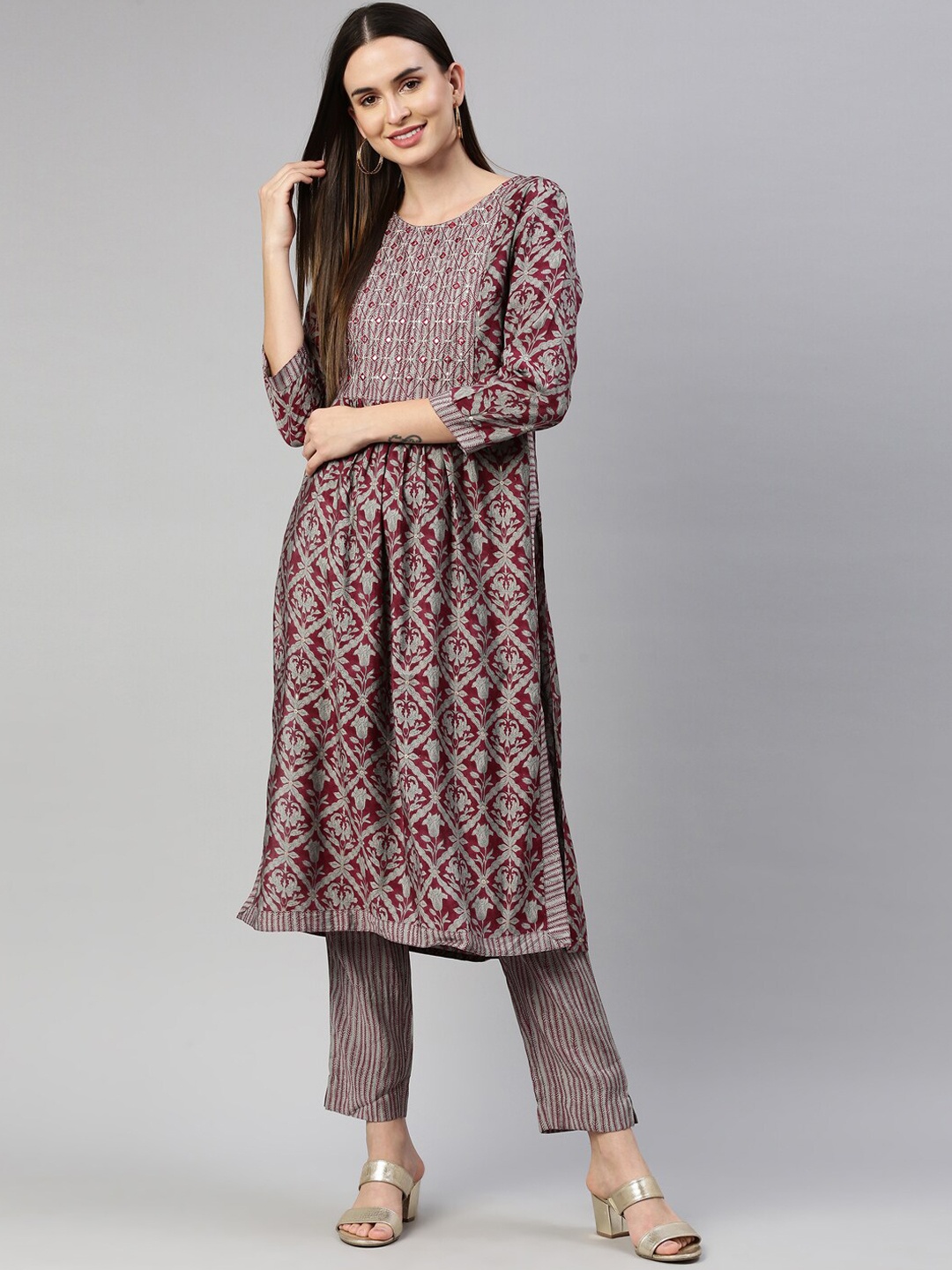 

Neerus Women Maroon Floral Printed Pleated Mirror Work Kurta with Trousers