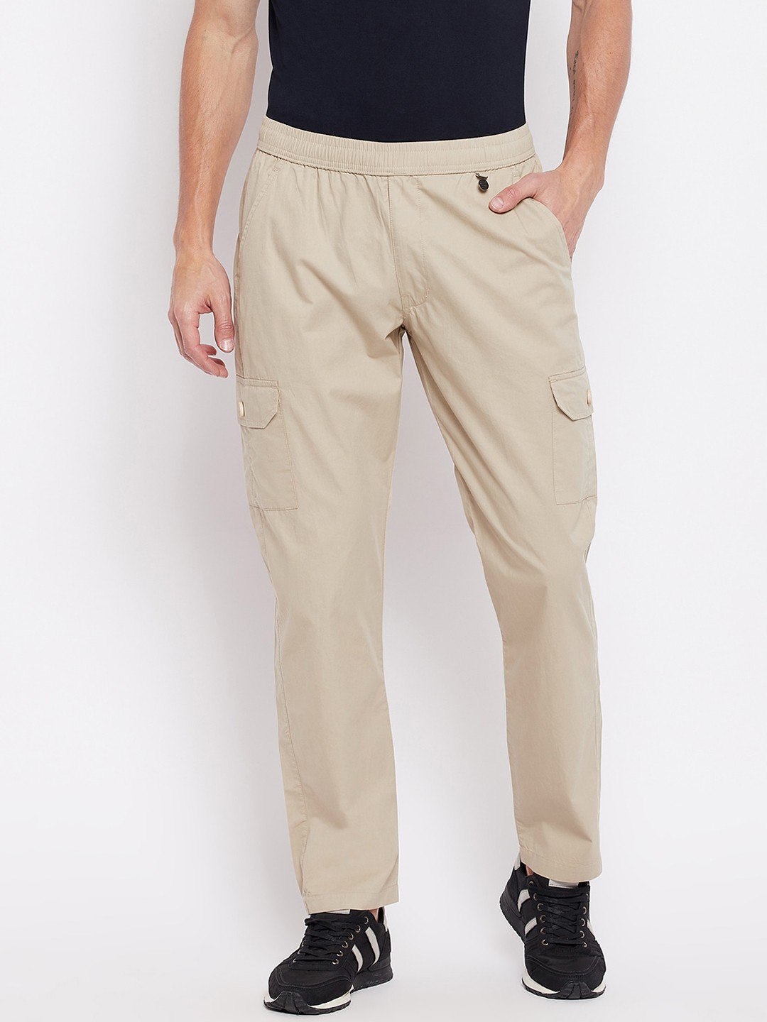

Okane Men Cream Solid Cotton Track Pants