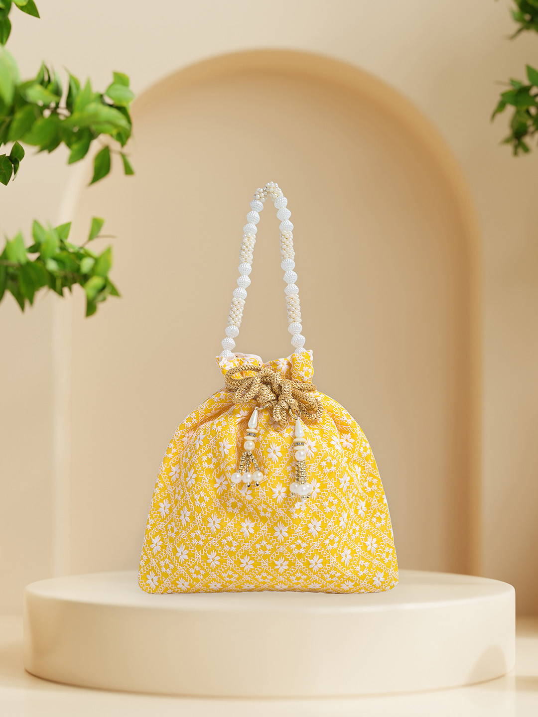

Golden Peacock Yellow & White Embroidered Potli Clutch