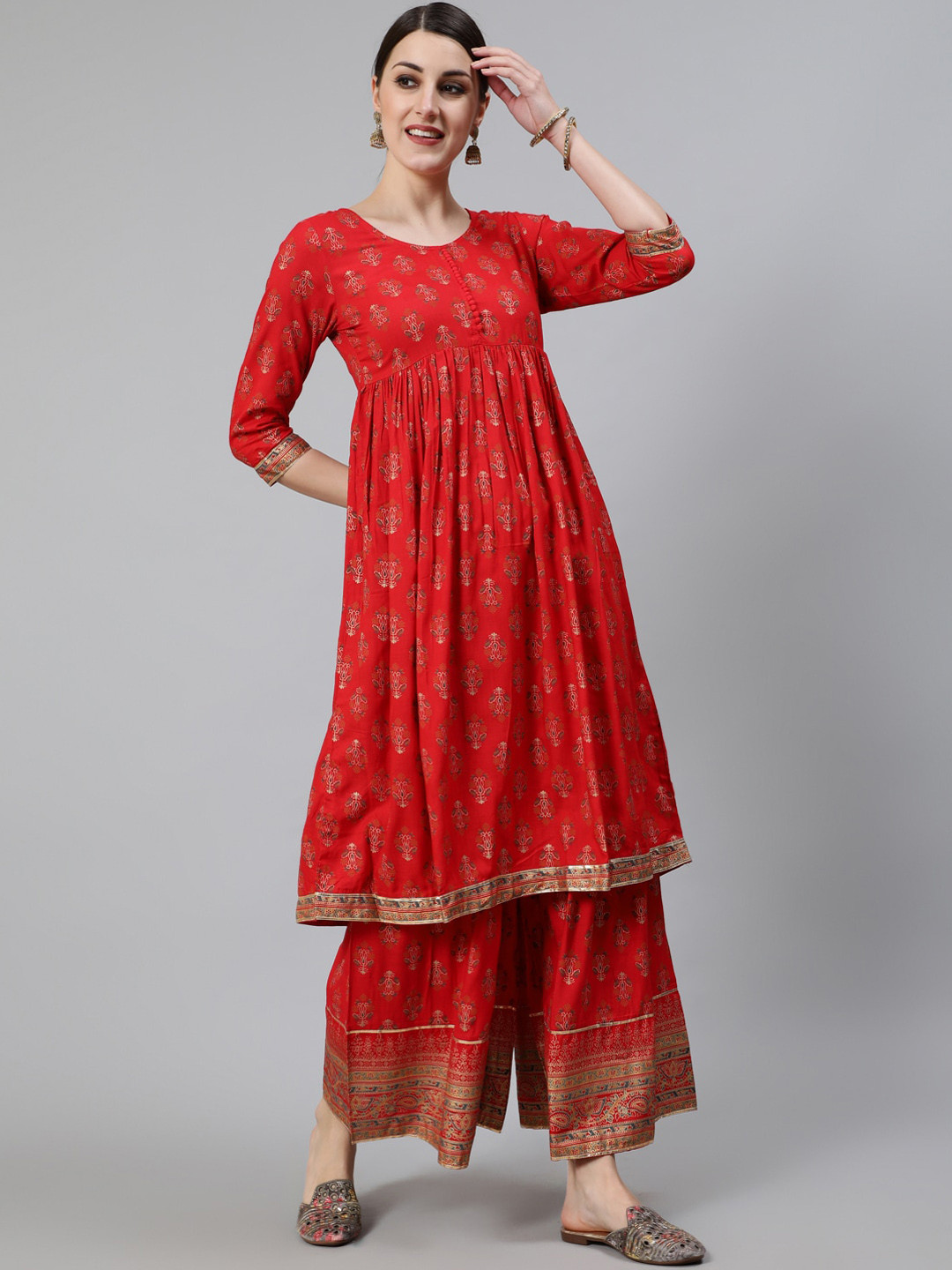 

Awadhi Women Red Printed Viscose Rayon Kurta with Palazzos