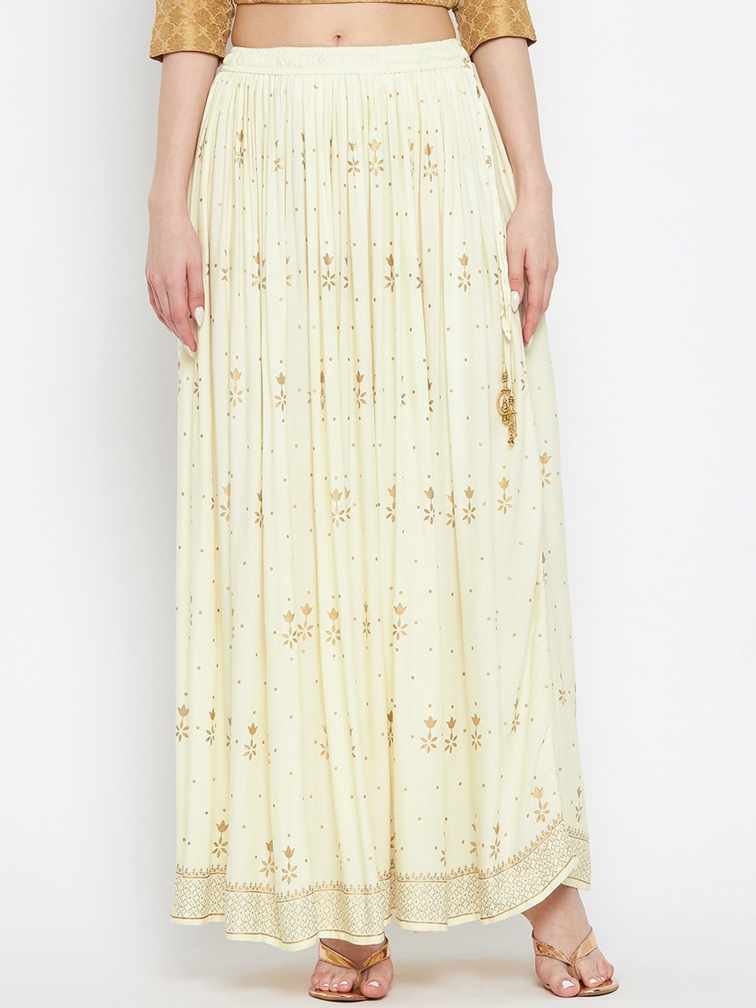 

Clora Creation Women Cream-Coloured & Gold-Coloured Printed Flared Maxi Skirt