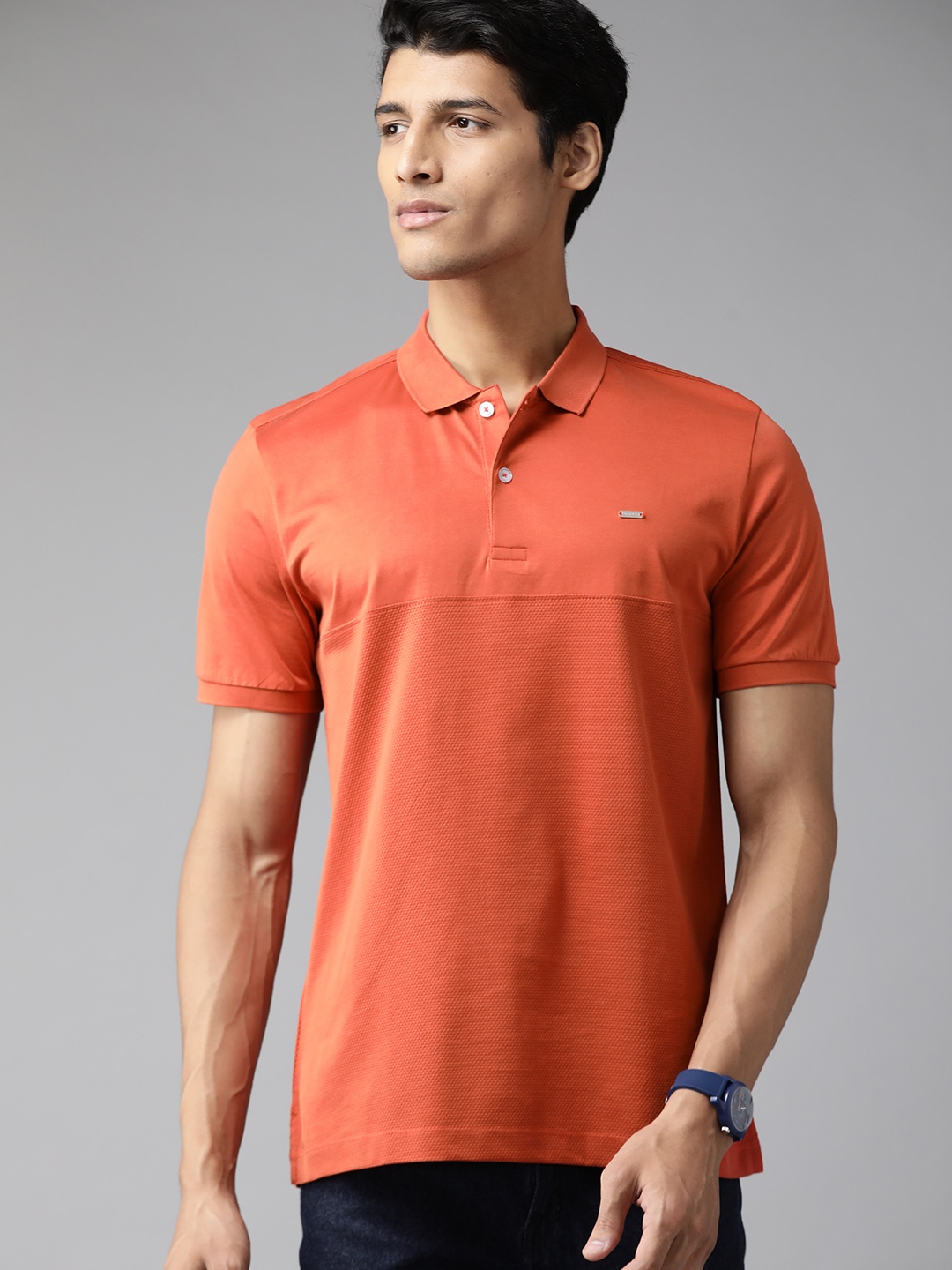 

Van Heusen Men Rust Red Textured Polo Collar Pure Cotton T-shirt