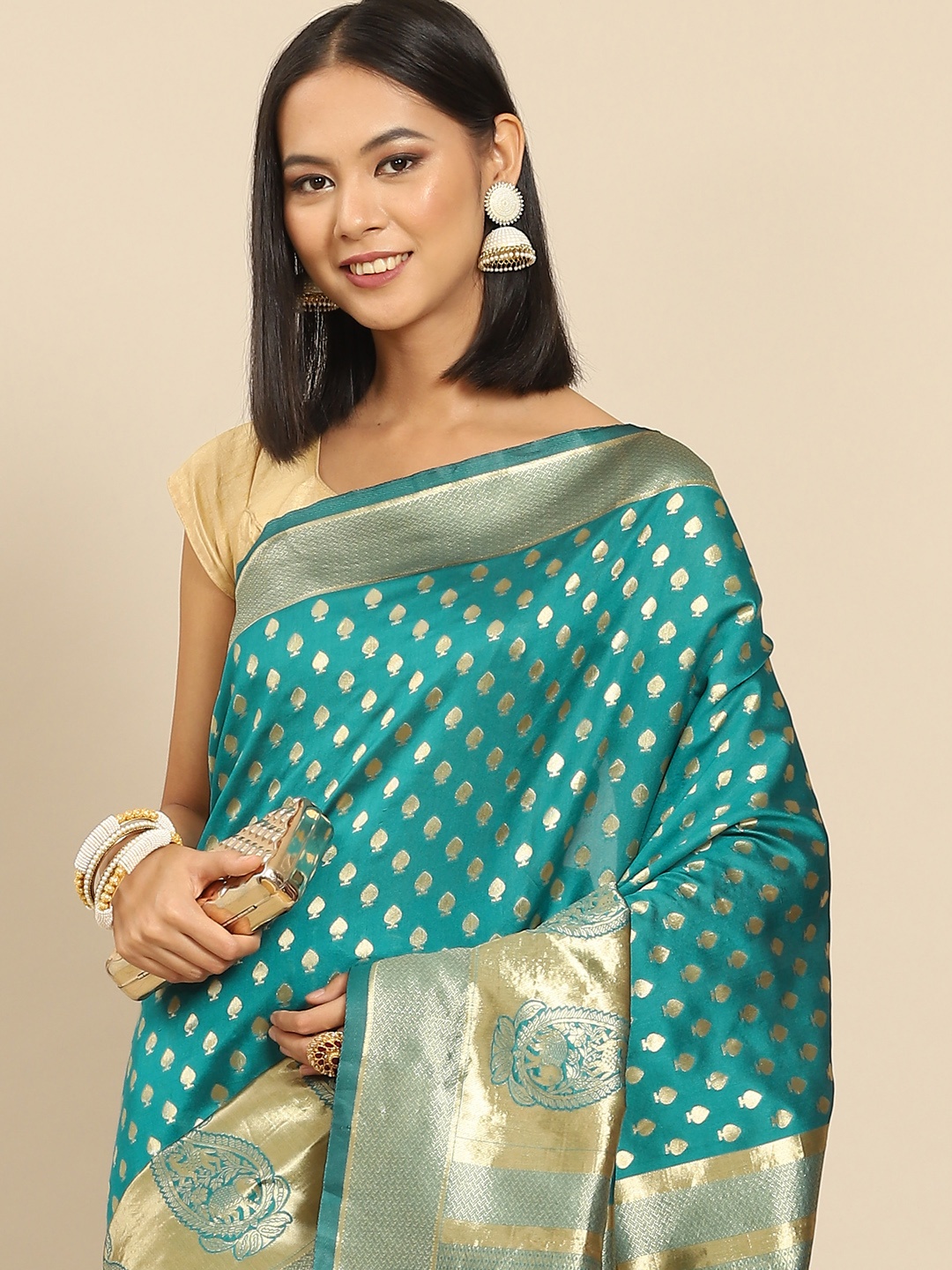 

Anouk Teal Green & Golden Woven Design Banarasi Saree