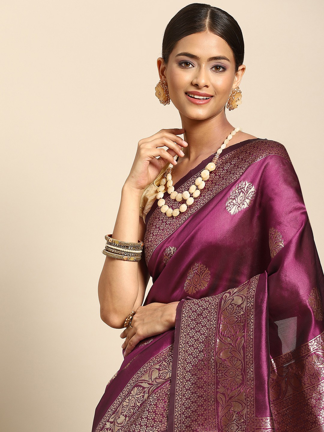 

Anouk Burgundy & Golden Ethnic Motifs Silk Blend Banarasi Saree