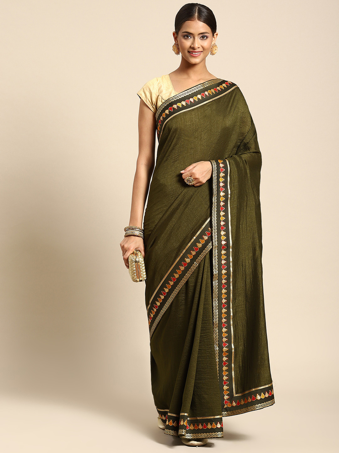 

Anouk Olive Green Solid Saree