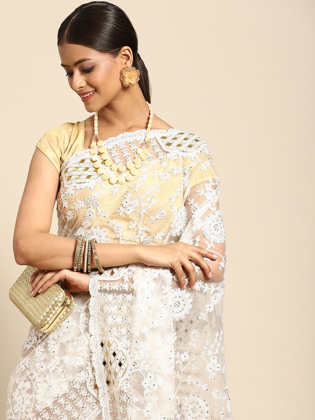 

Anouk Off White Ethnic Motifs Net Saree