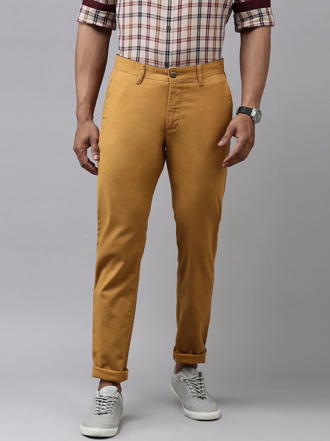 

Van Heusen Sport Men Khaki Self-Design Tapered Fit Regular Trousers