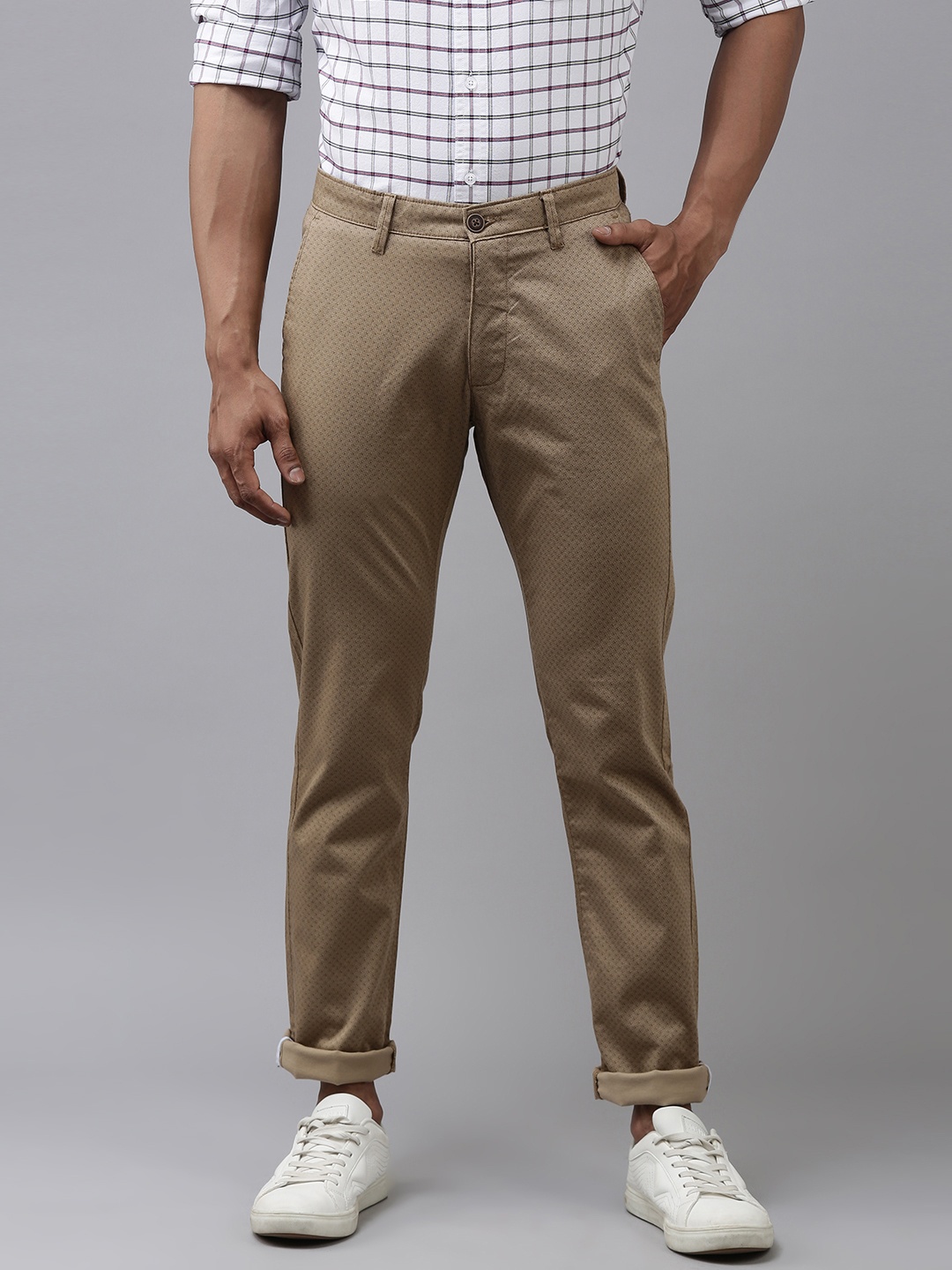 

Van Heusen Sport Men Khaki Self-Design Tapered Fit Trousers