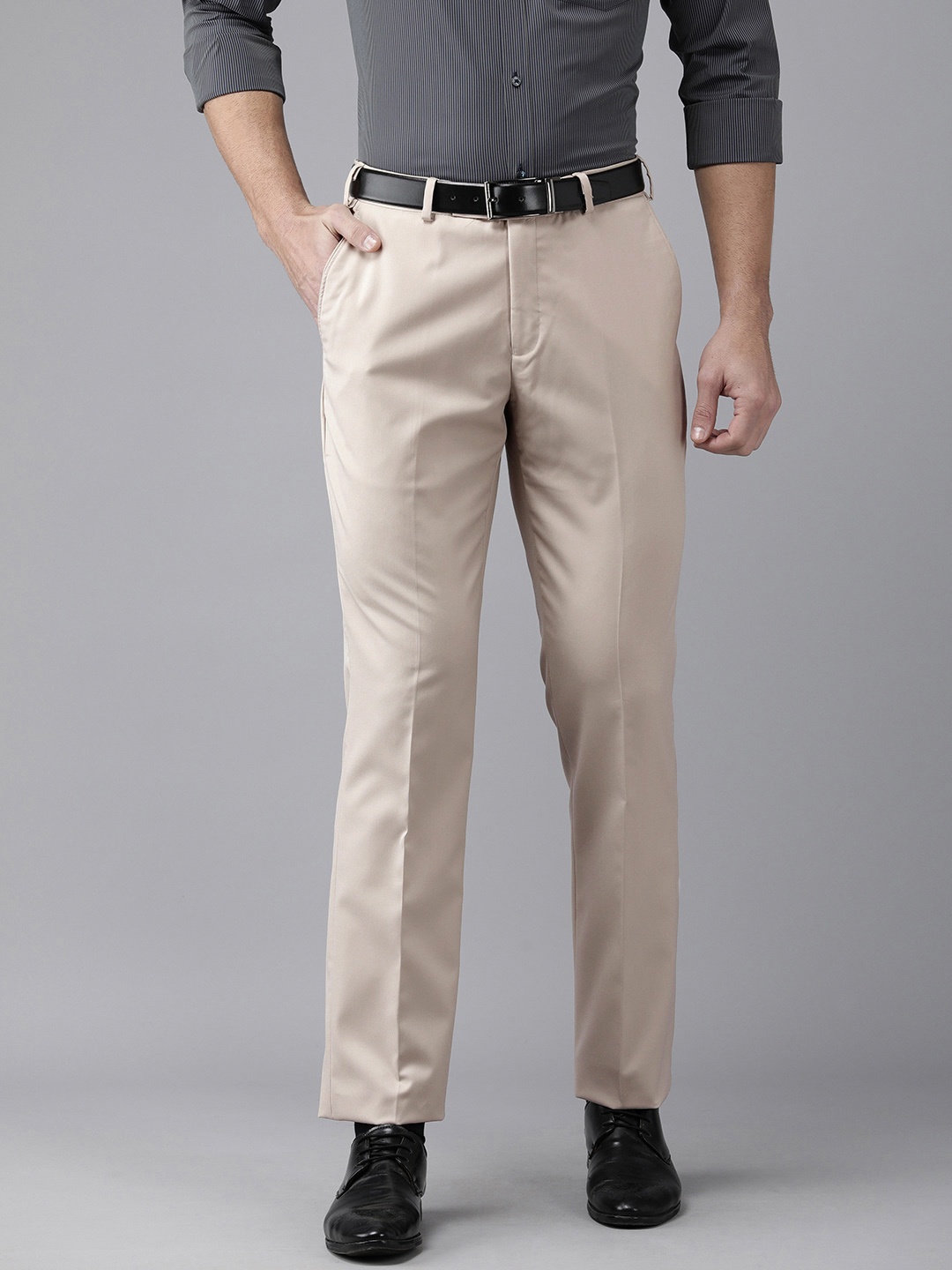 

Park Avenue Men Beige Solid Formal Trousers