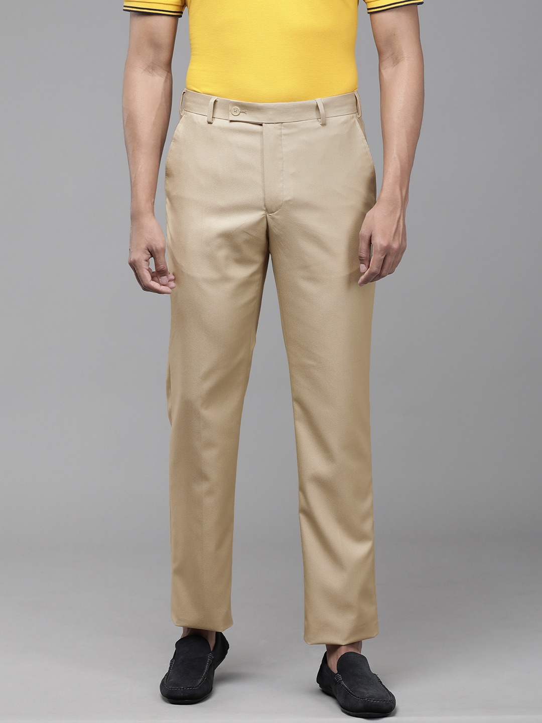 

Park Avenue Men Beige Solid Smart Fit Trousers