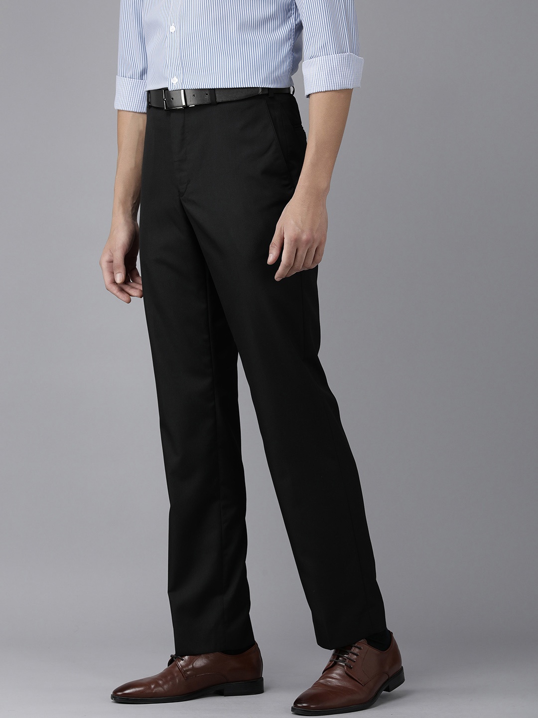 

Park Avenue Men Black Solid Mid-Rise Formal Trousers