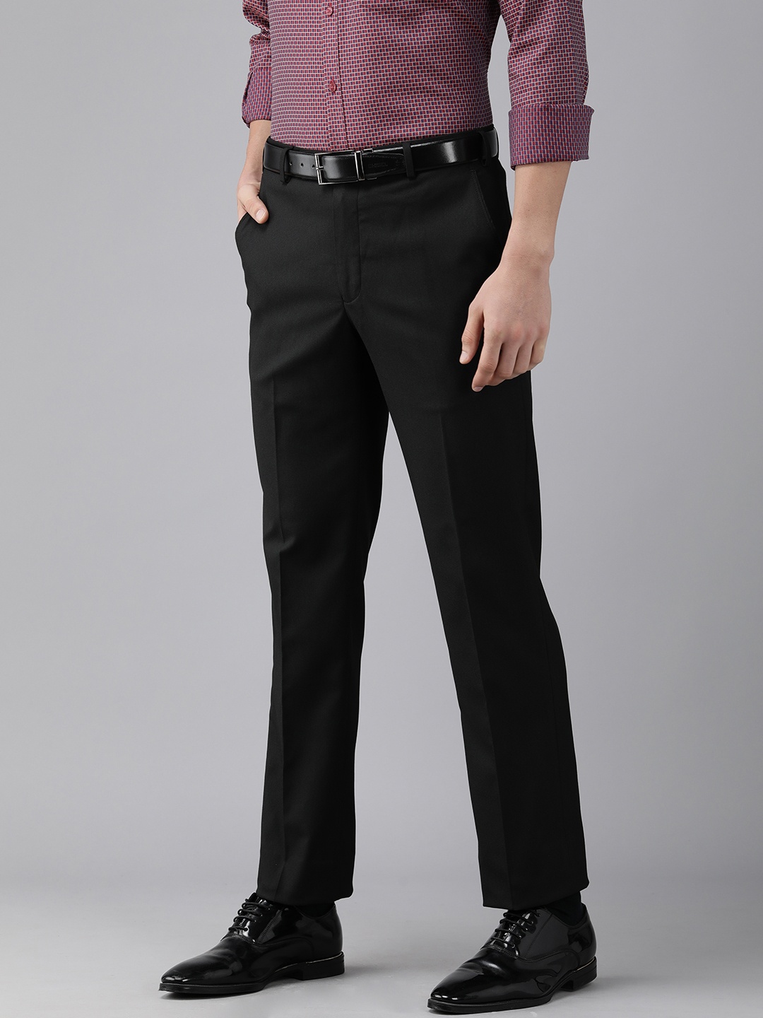 

Park Avenue Men Black Solid Mid Rise Regular Fit Formal Trousers