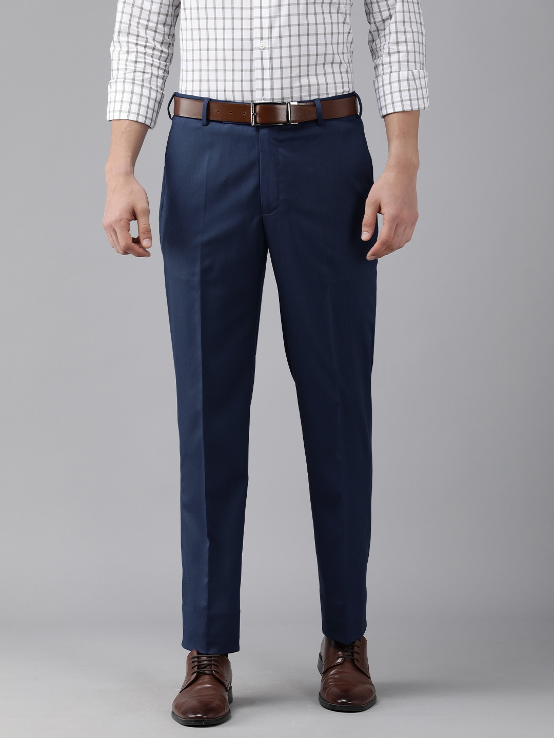 

Park Avenue Men Dark Blue Solid Mid-Rise Formal Trousers