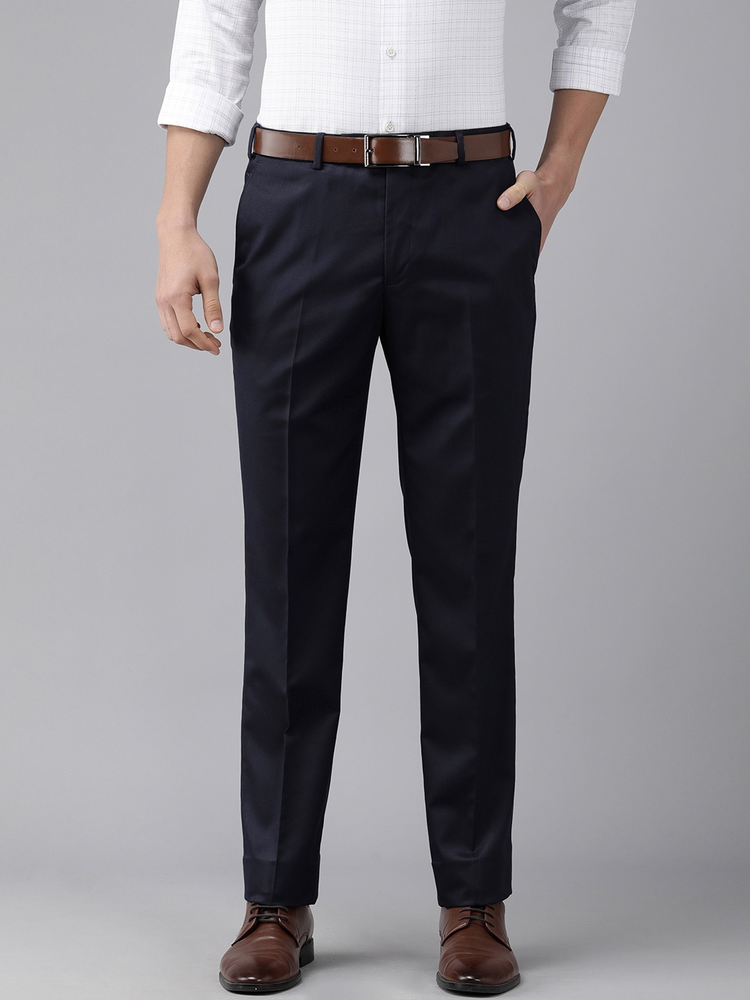 

Park Avenue Men Dark Blue Self Designed Mid Rise Regular Fit Formal Trousers