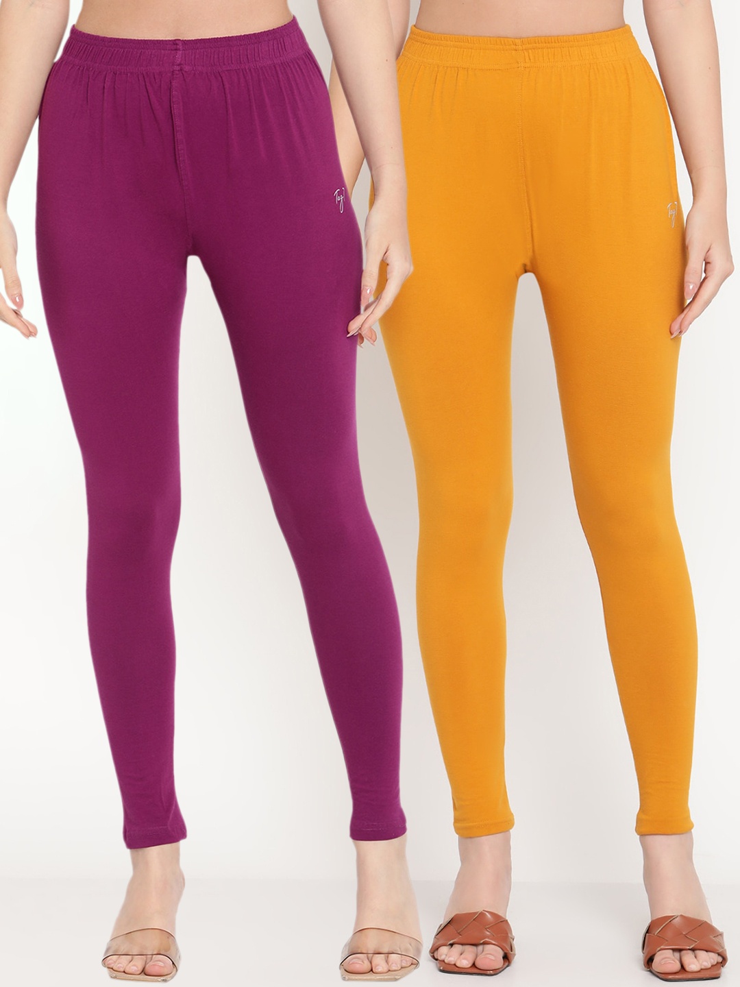 

TAG 7 Women Purple & Mustard Solid Ankle-Length Leggings Pack Of 2