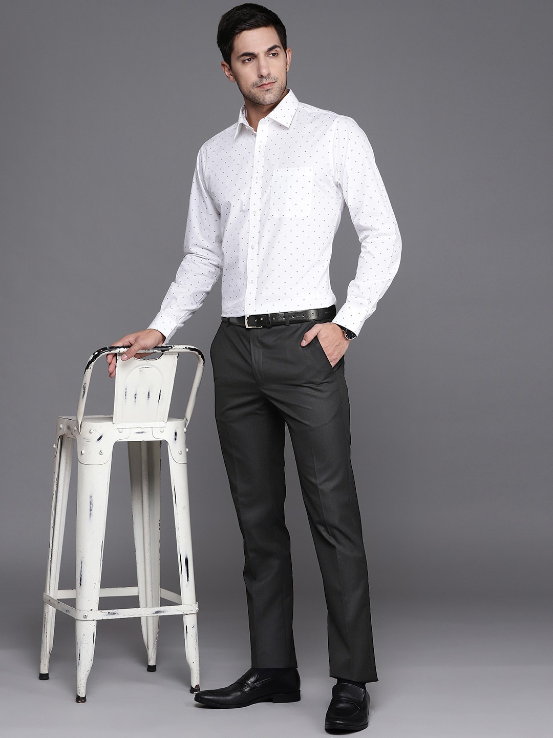 

Raymond Men Black Solid Slim Fit Flat Front Trousers