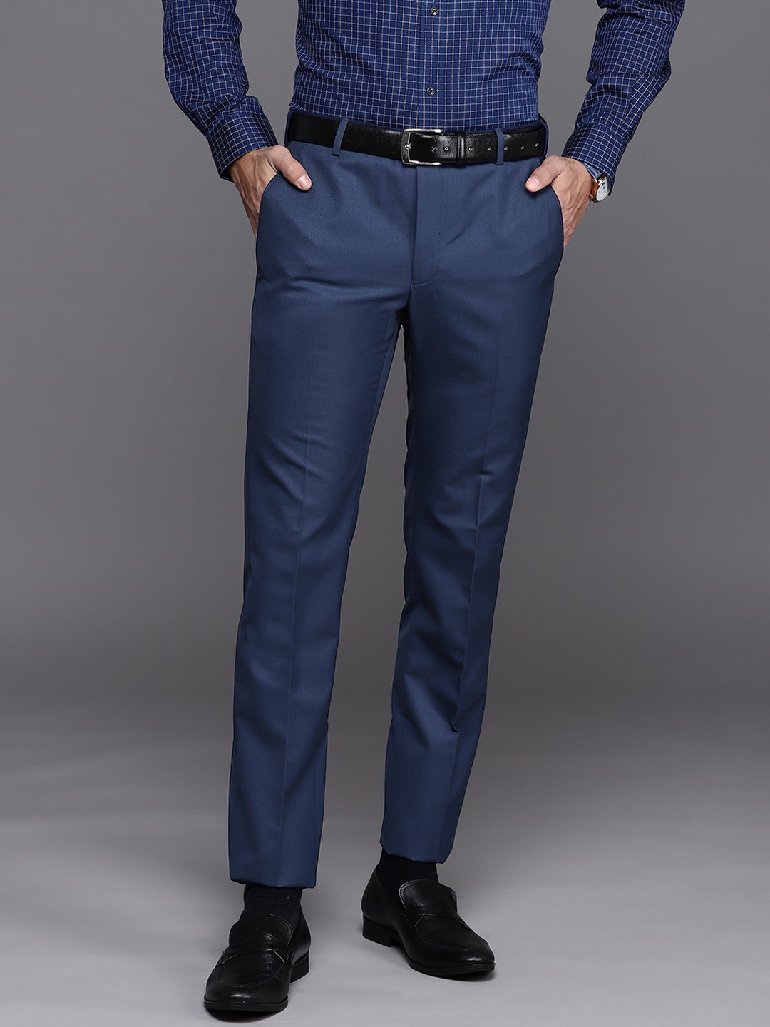 

Raymond Men Navy Blue Solid Slim Fit Flat Front Trousers
