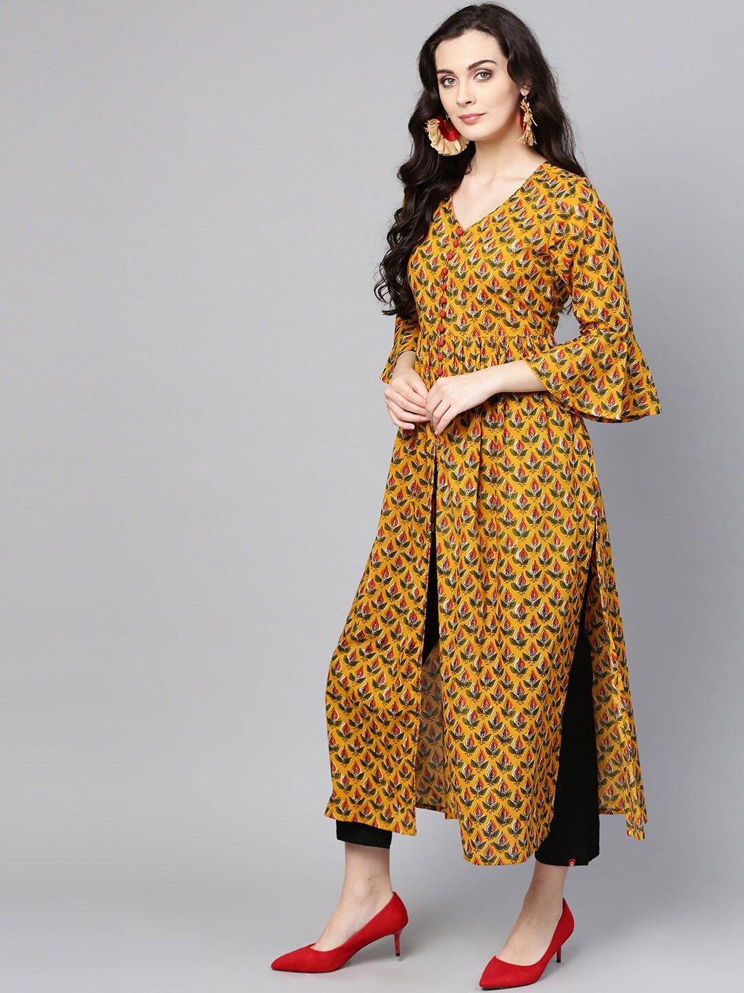 

Varanga Women Mustard Yellow & Green Floral Printed Flared Sleeves A-line Kurta