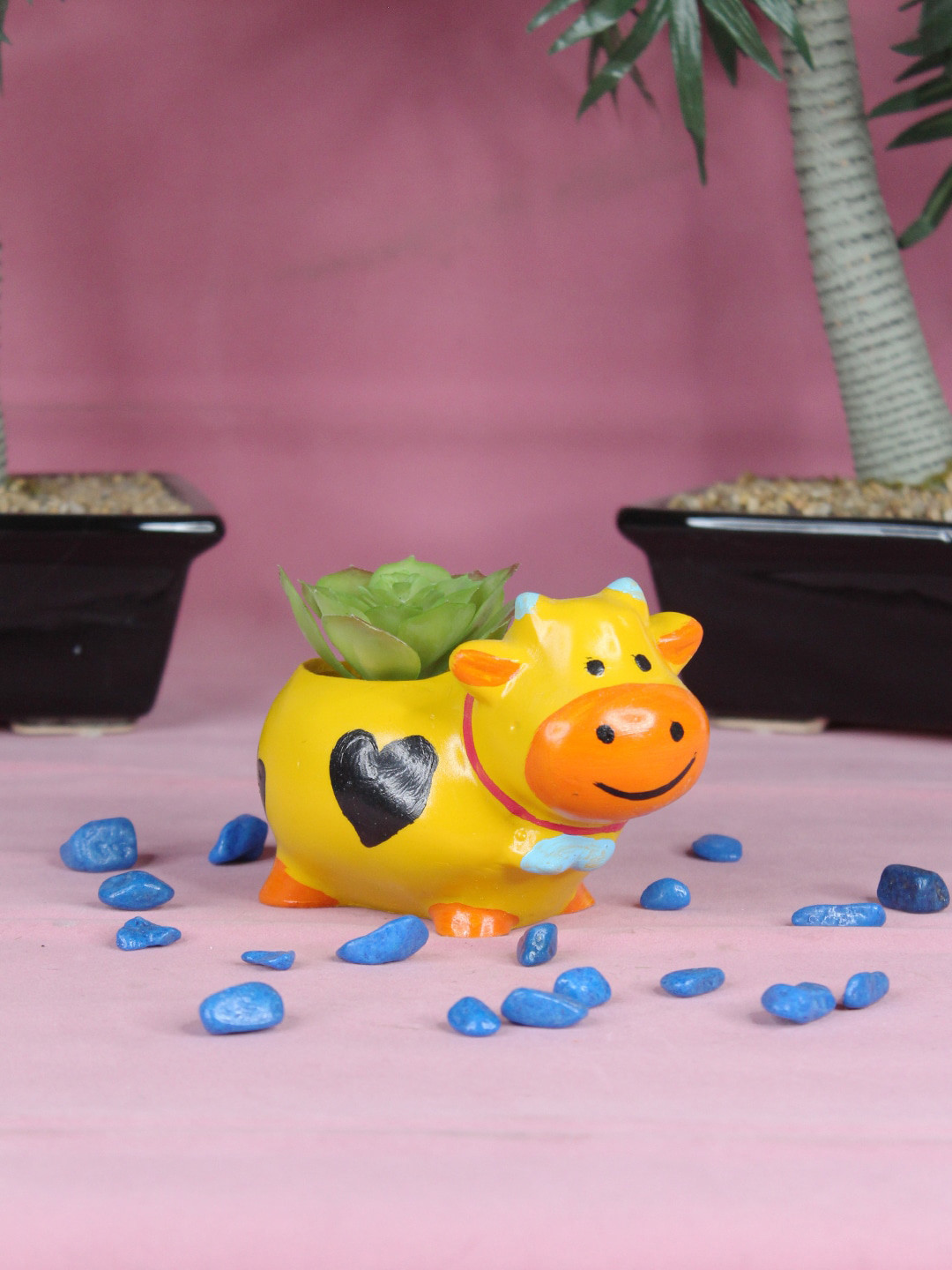 

Wonderland Yellow & Orange Resin Cow Shaped Planter