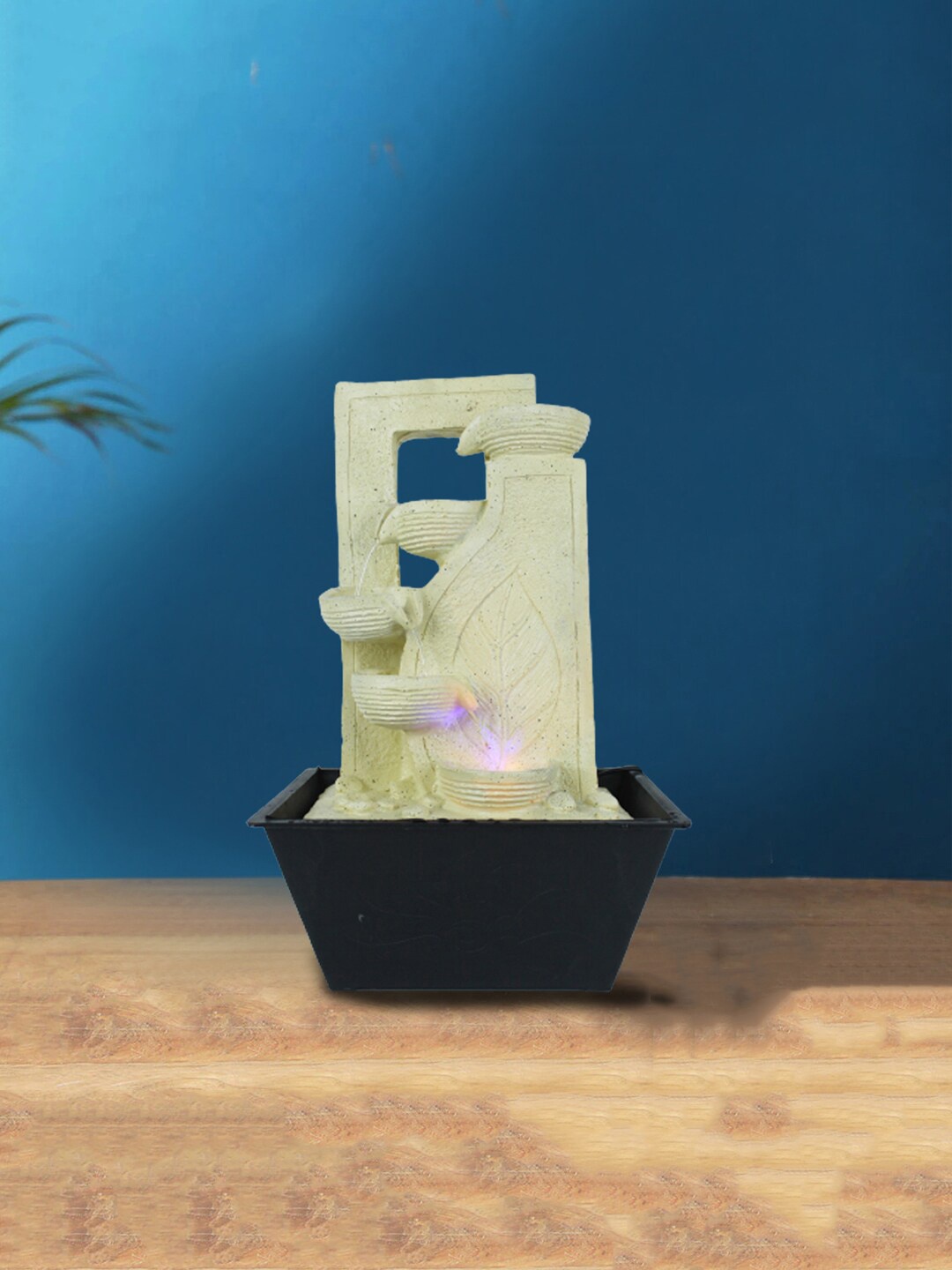 

Wonderland Beige Table Top Leaf Step Fountain Statue