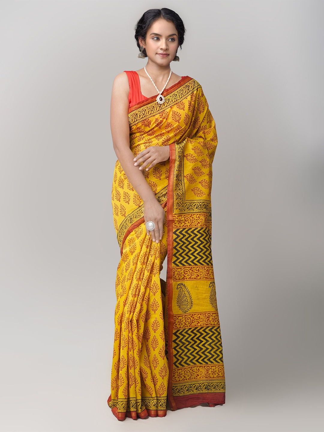 

Unnati Silks Yellow & Red Ethnic Motifs Silk Cotton Chanderi Saree