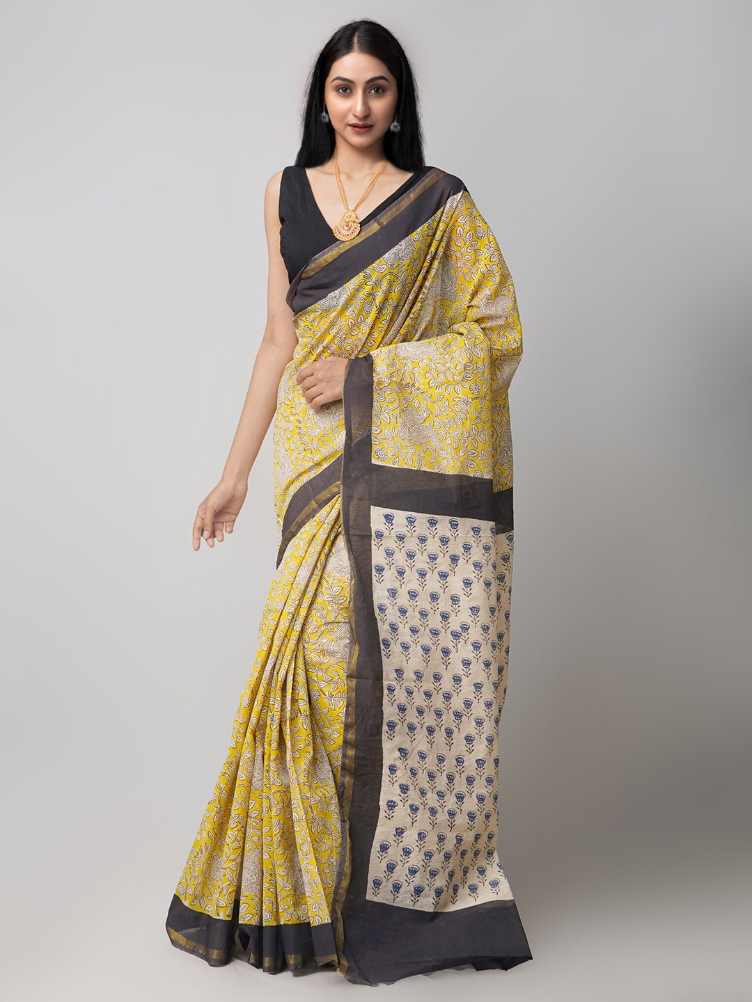 

Unnati Silks Yellow & Black Floral Zari Silk Cotton Chanderi Saree