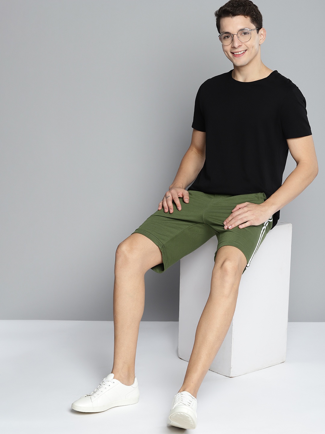 

Mast & Harbour Men Olive Green Solid Shorts