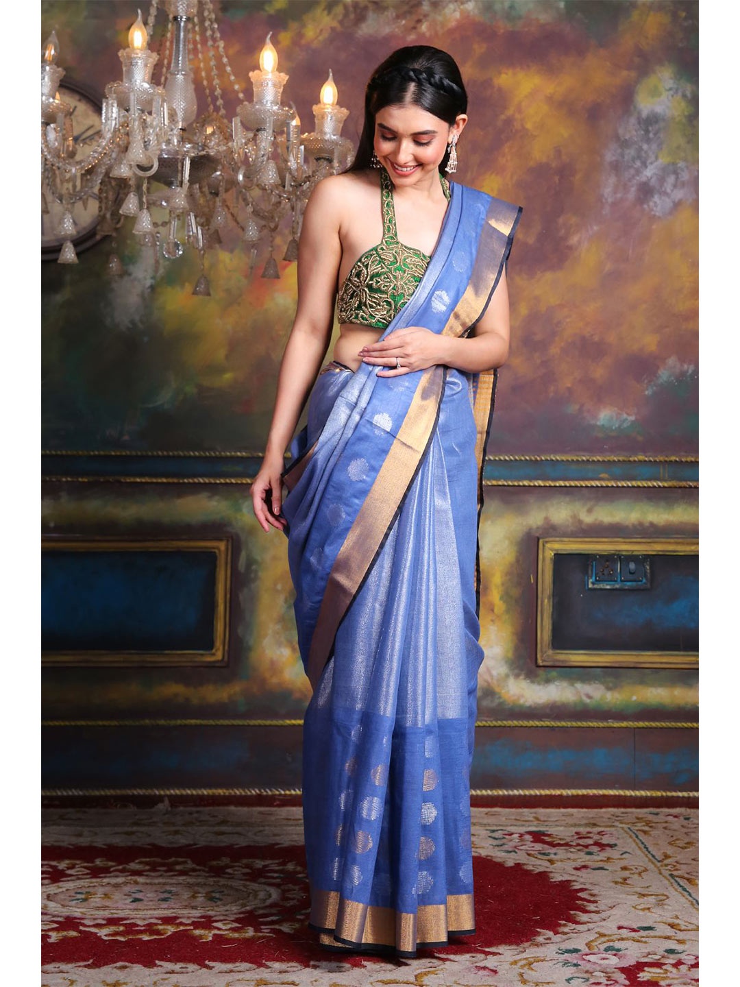 

Charukriti Blue & Gold-Toned Woven Design Zari Tissue Saree