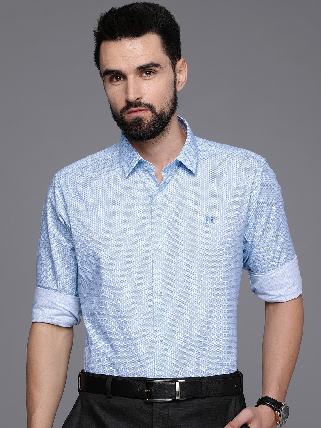 

Raymond Men Blue Slim Fit Geometric Printed Pure Cotton Formal Shirt