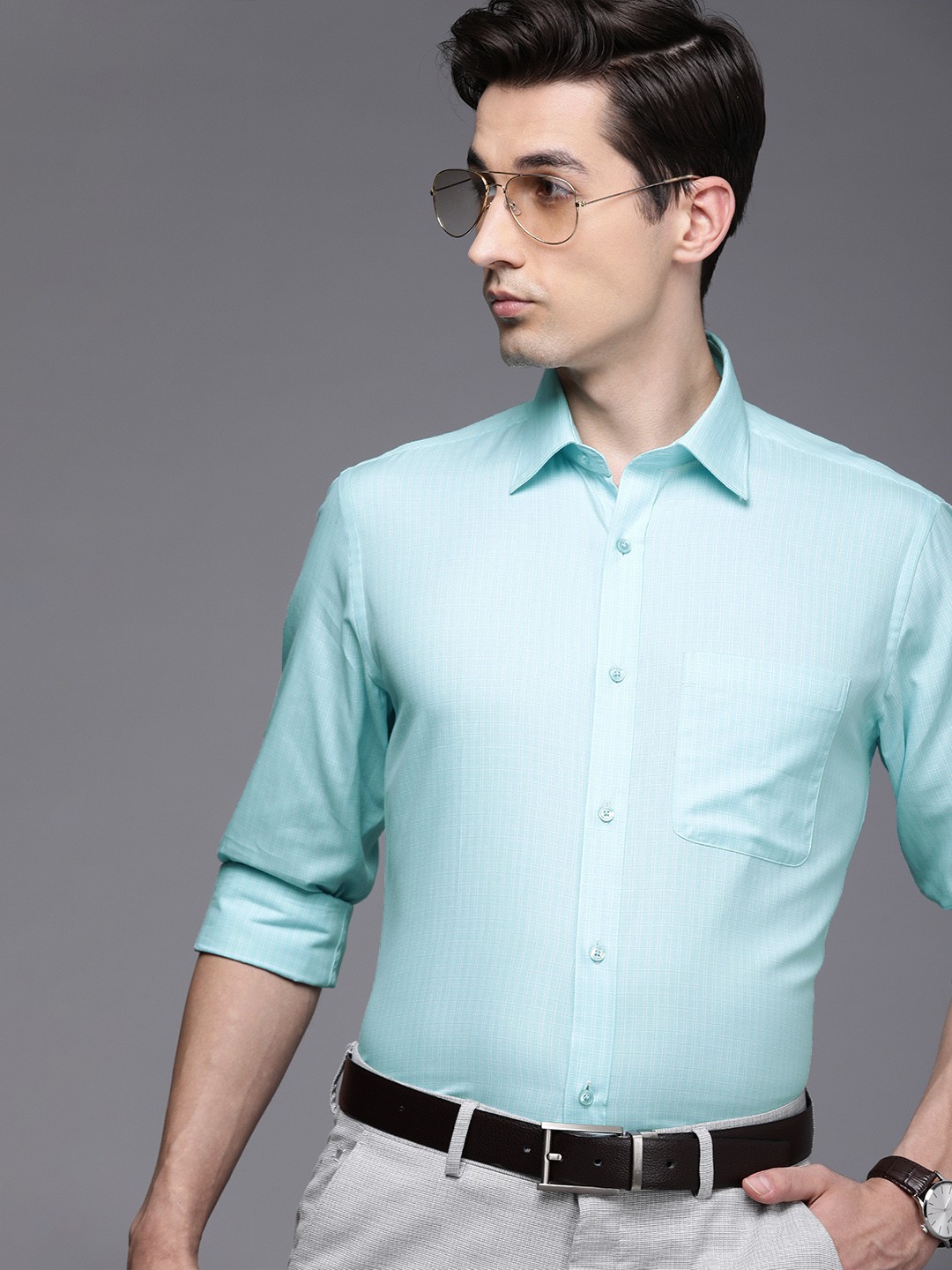 

Raymond Men Blue & White Checked Slim Fit Pure Cotton Formal Shirt