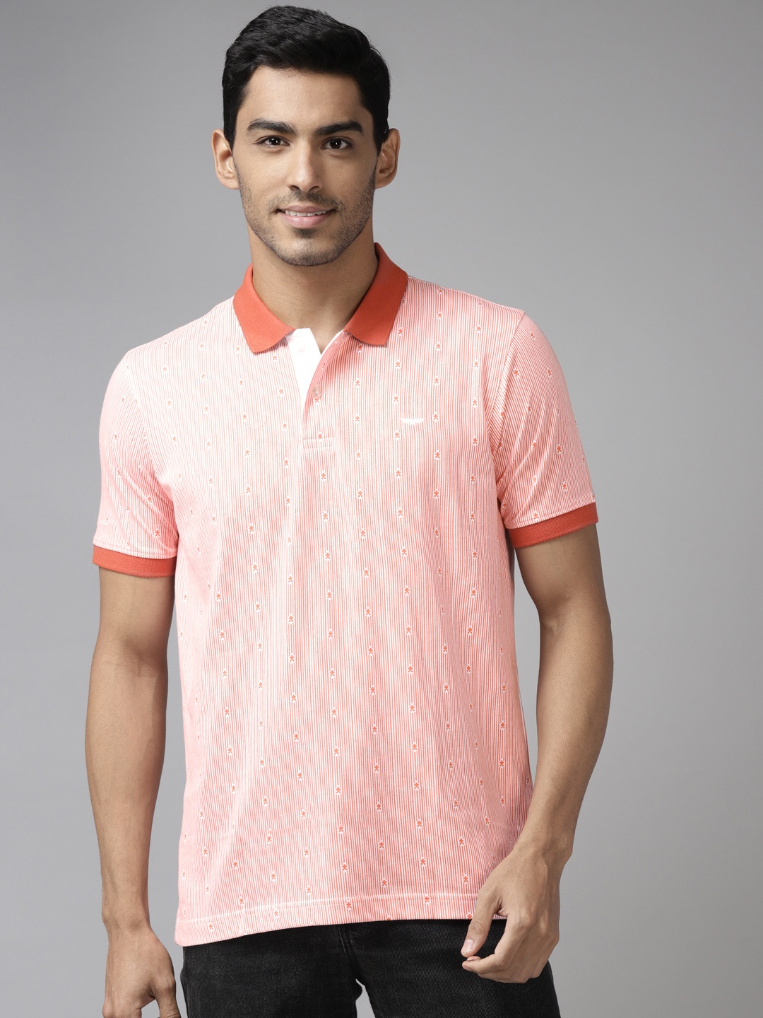 

Park Avenue Men Coral Red & White Striped Polo Collar Slim Fit T-shirt