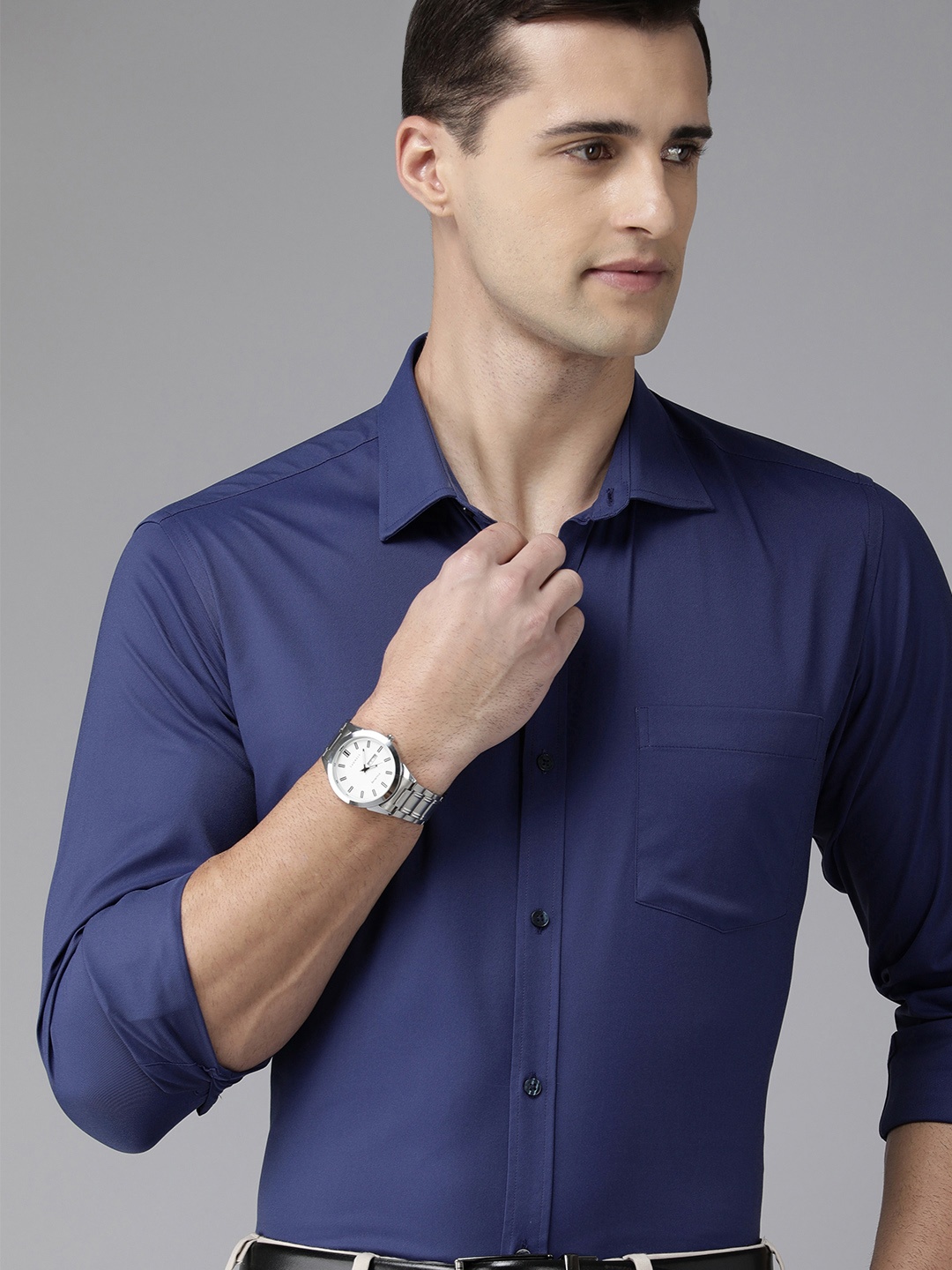 

Park Avenue Men Blue Solid Slim Fit Formal Shirt