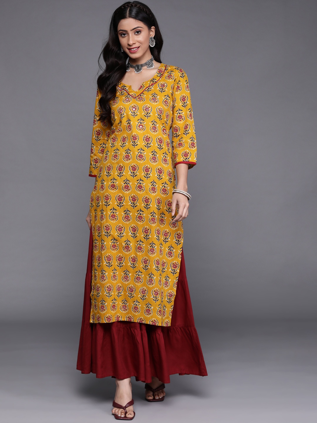 

Varanga Women Mustard Yellow & Red Floral Embellished Kurta