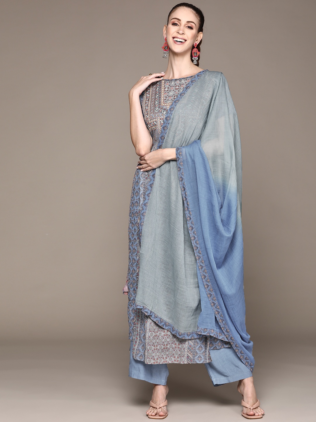 

Ritu Kumar Women Blue Floral Kurta with Palazzos & With Dupatta