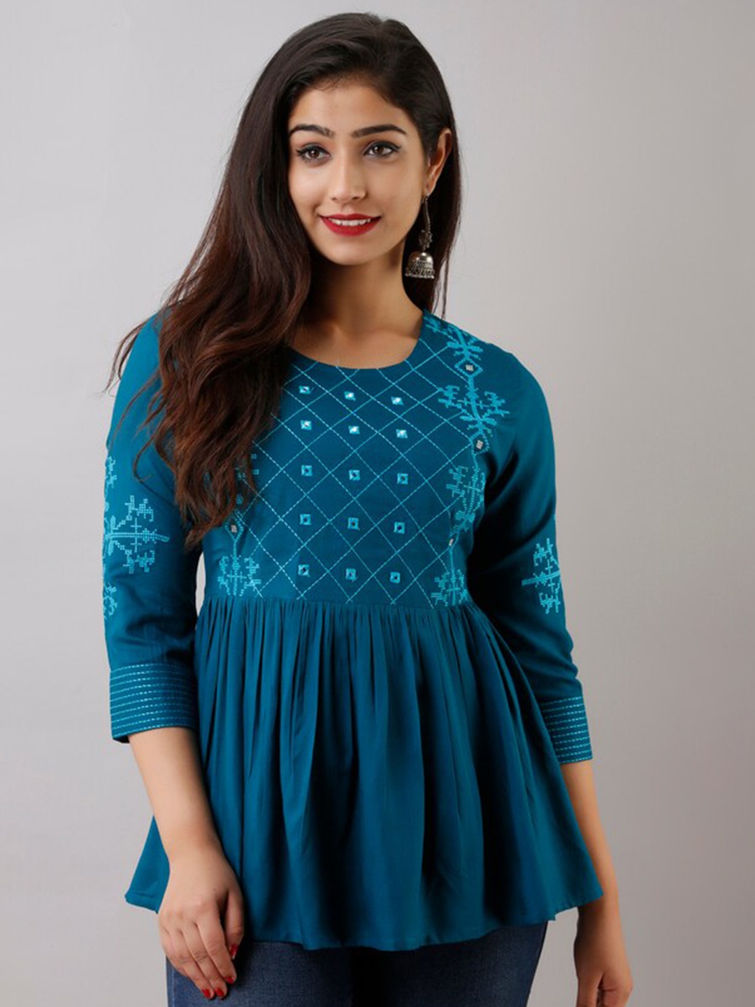 

NITVAN Blue Geometric Embroidered Peplum Top