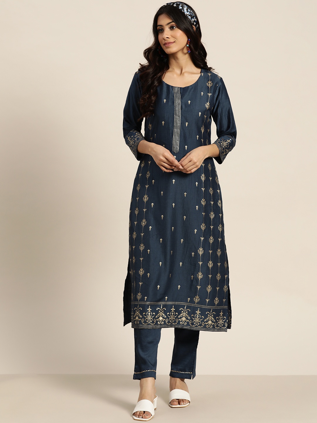 

Sangria Women Teal Blue Ethnic Motifs Embroidered Kurta with Trousers