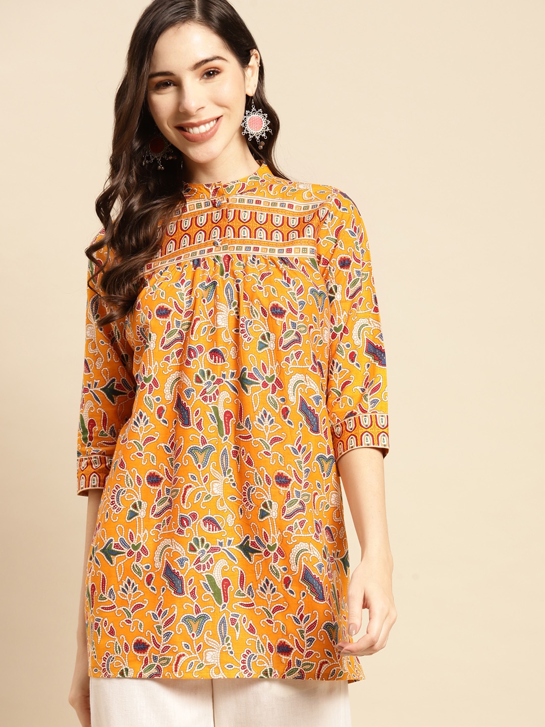 

Prakrti Mustard Yellow & Red Ethnic Motifs Printed Pure Cotton Pleated Kurti
