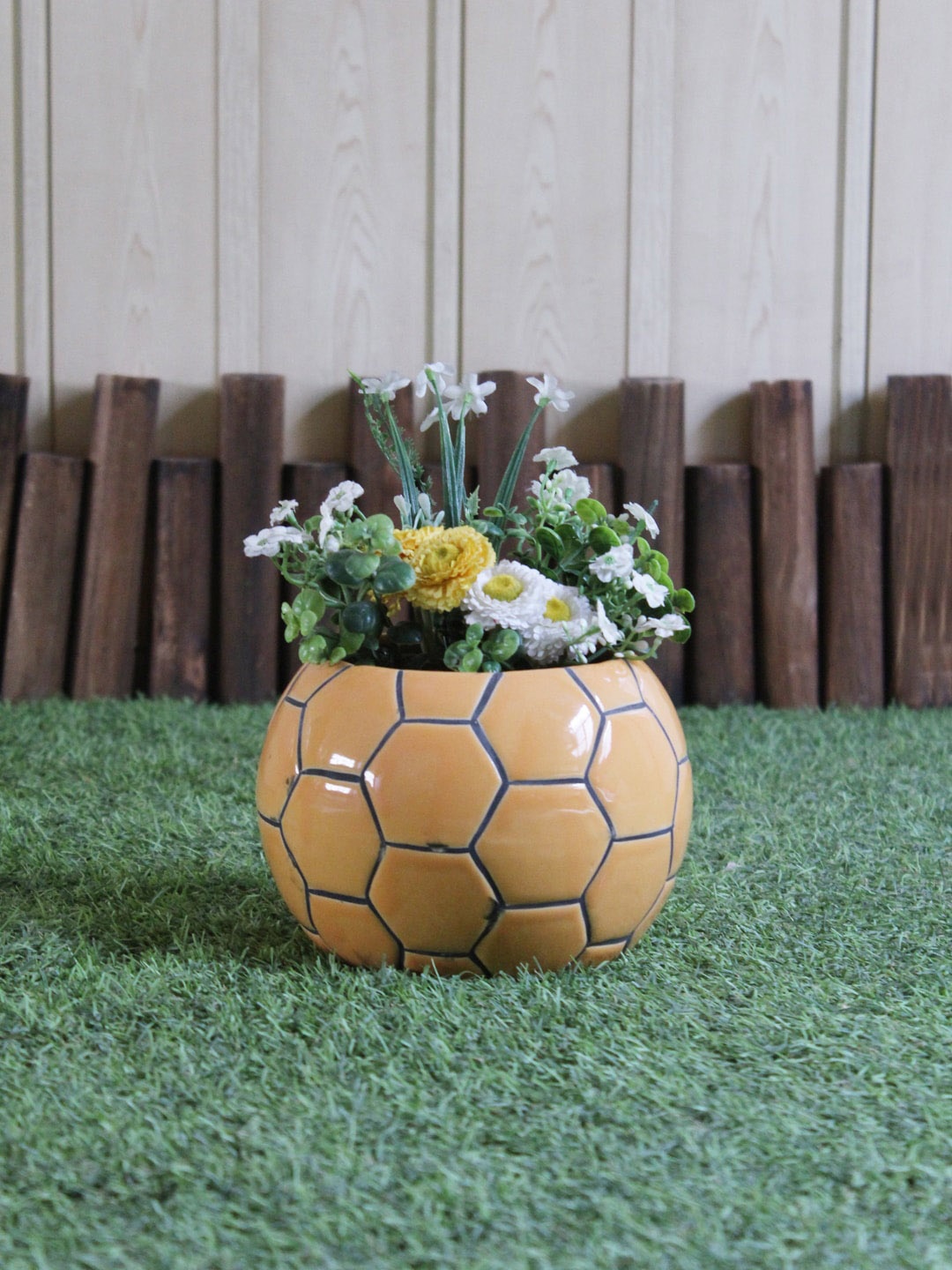 

Wonderland Yellow Ceramic Flower pot Football Planter