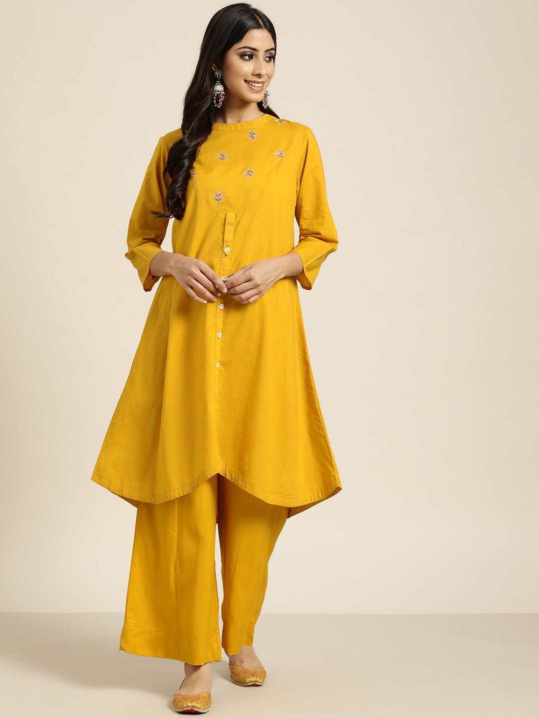 

Sangria Women Mustard Yellow Ethnic Motifs Embroidered Kurta with Palazzos