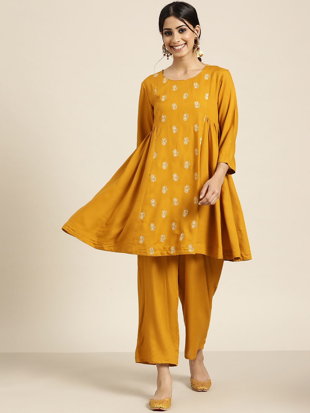 

Sangria Women Mustard Yellow Ethnic Motifs Sequinned Kurta with Palazzos