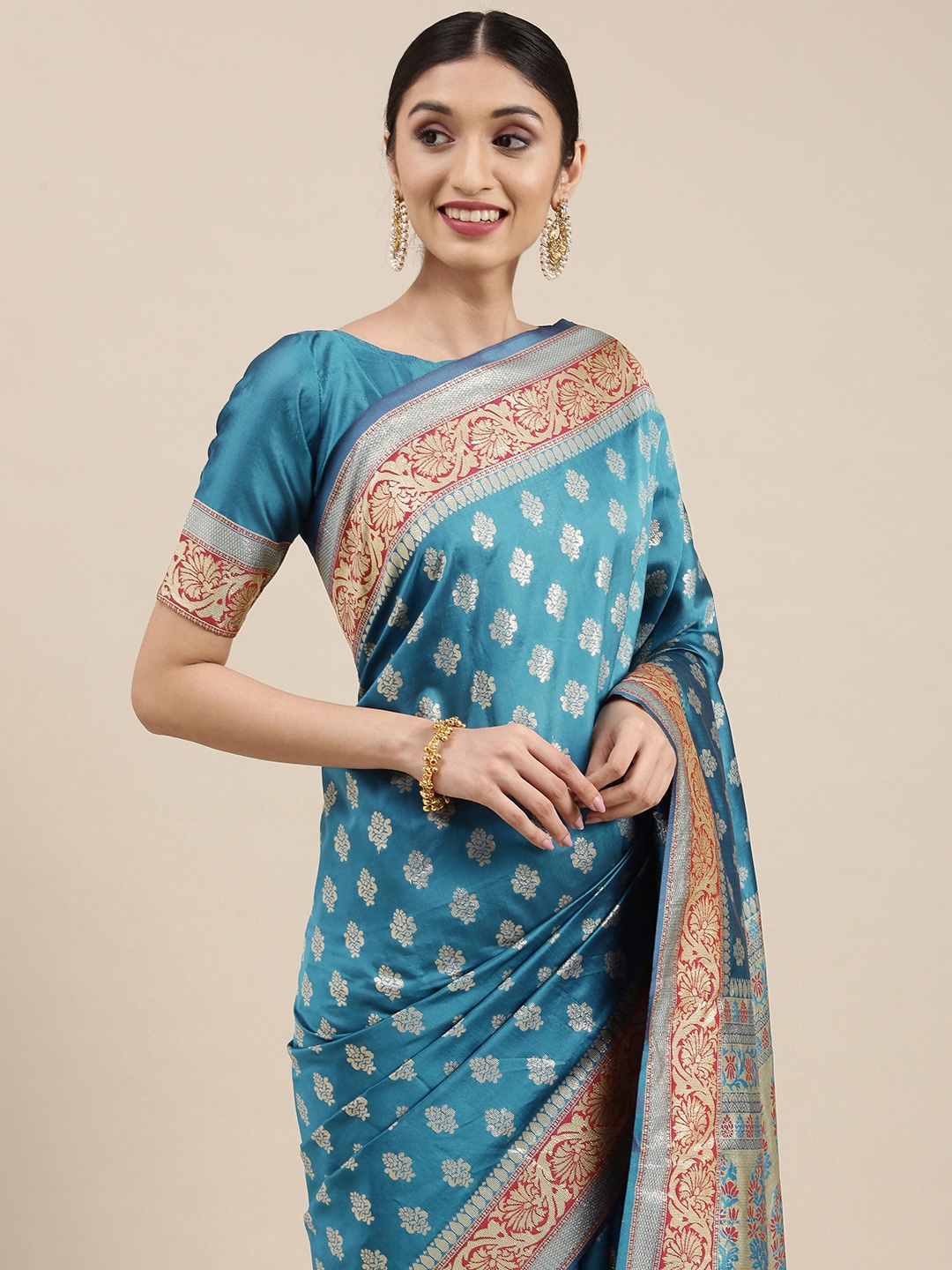 

VAIRAGEE Blue & Silver-Toned Ethnic Motifs Zari Saree
