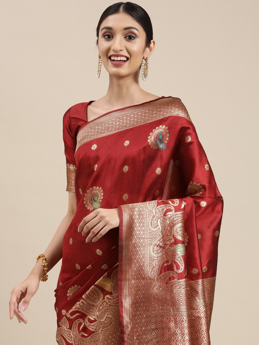 

VAIRAGEE Maroon & Gold-Toned Ethnic Motifs Zari Saree
