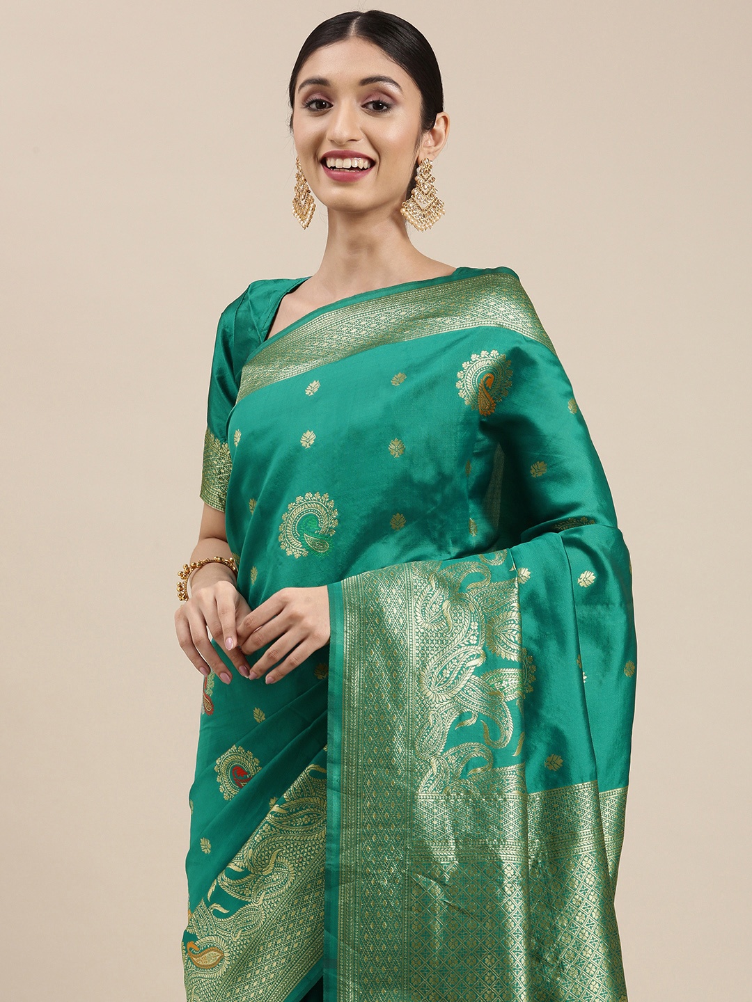 

VAIRAGEE Teal & Gold-Toned Ethnic Motifs Zari Saree