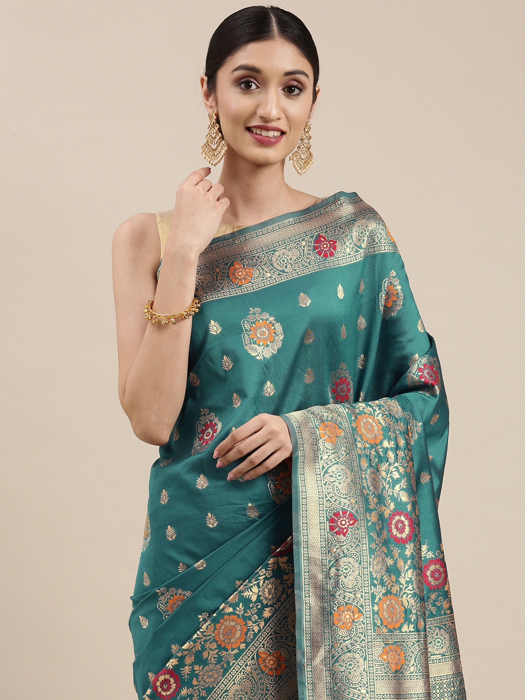 

VAIRAGEE Teal & Gold-Toned Ethnic Motifs Zari Saree