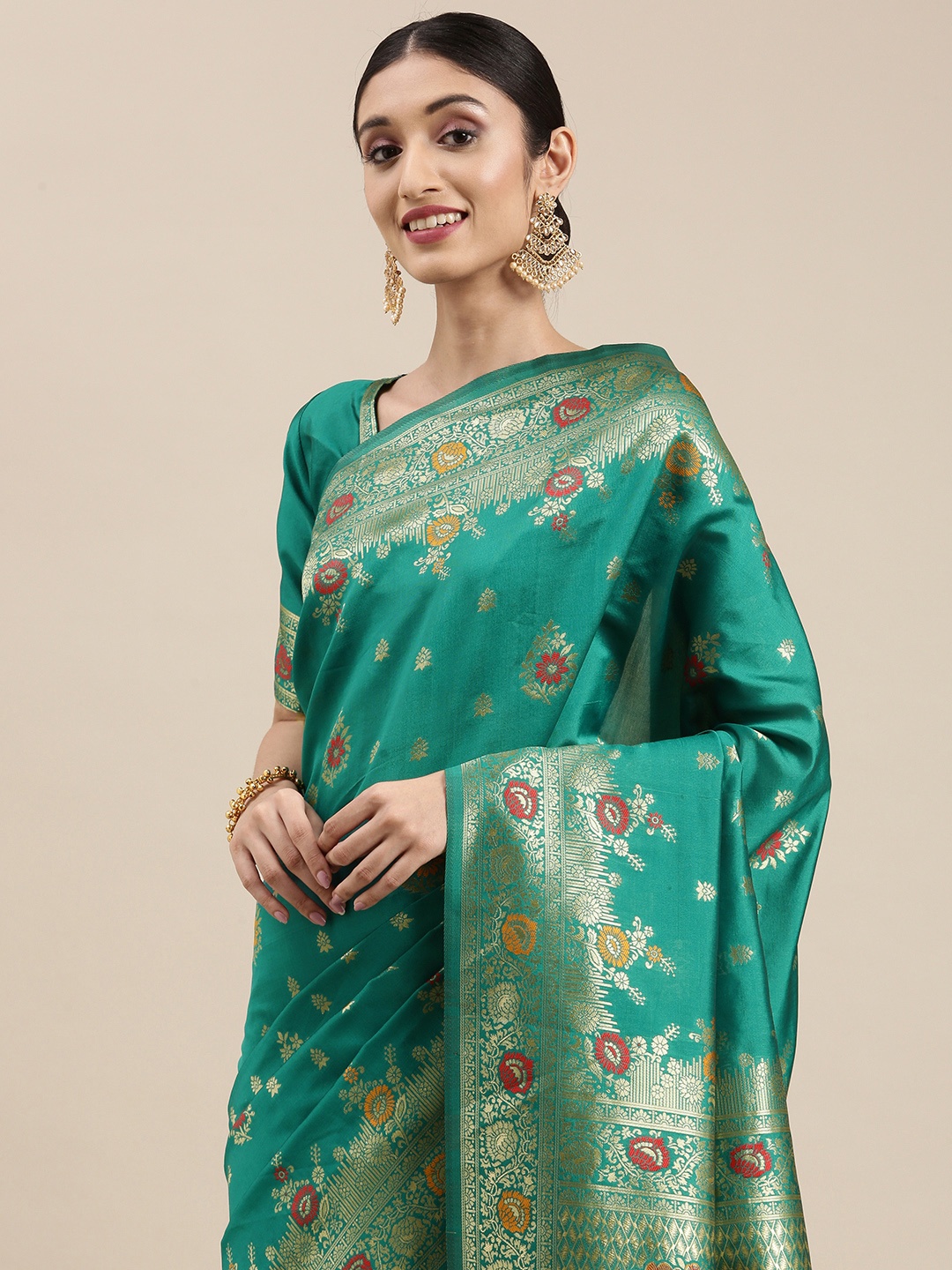 

VAIRAGEE Teal & Gold-Toned Ethnic Motifs Zari Saree
