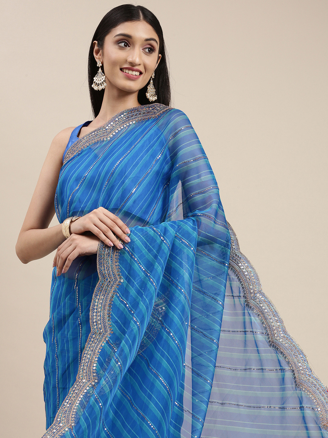 

VAIRAGEE Blue Striped Sequinned Organza Saree