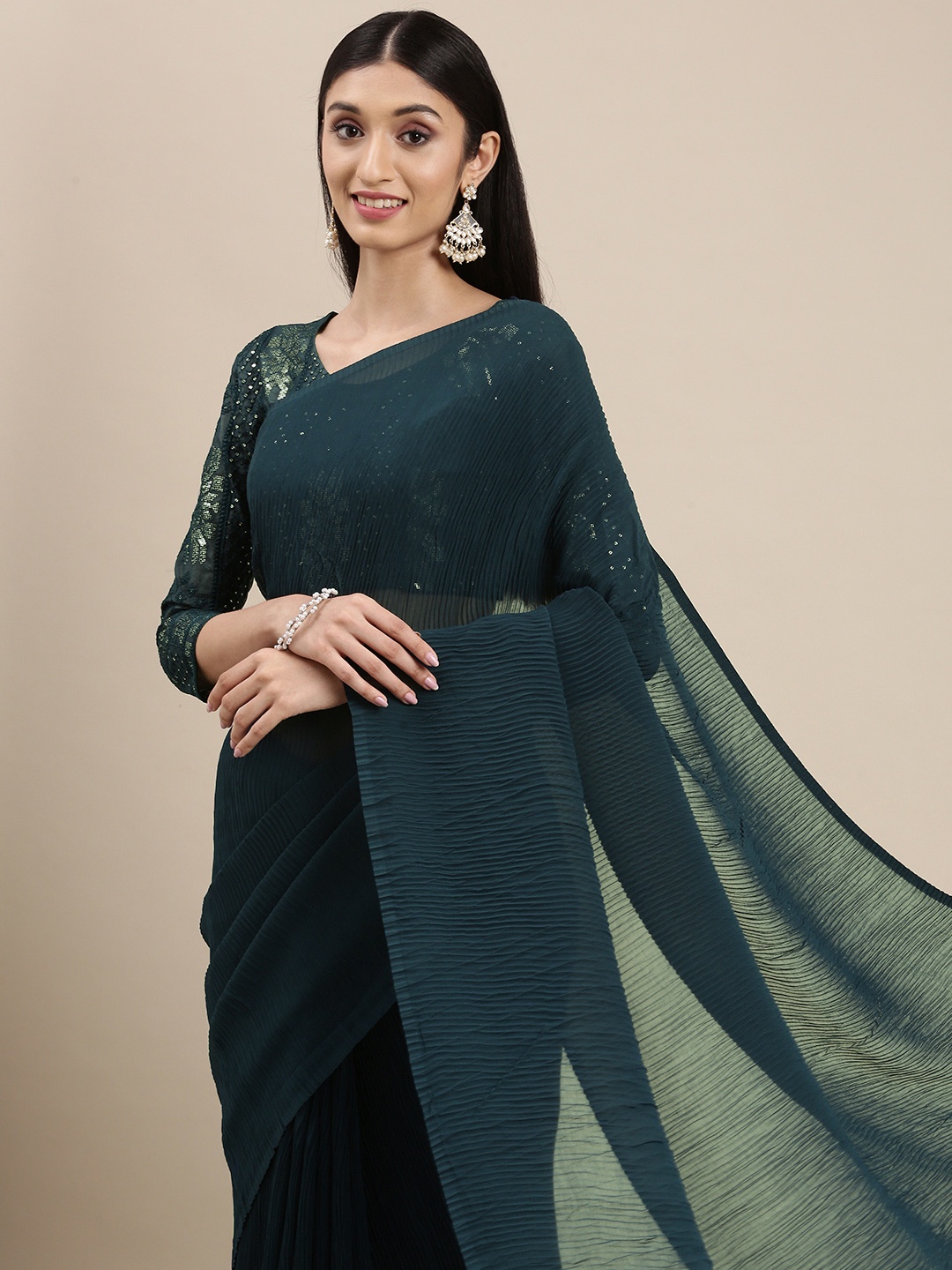 

VAIRAGEE Teal Embroidered Accordion Pleated Saree