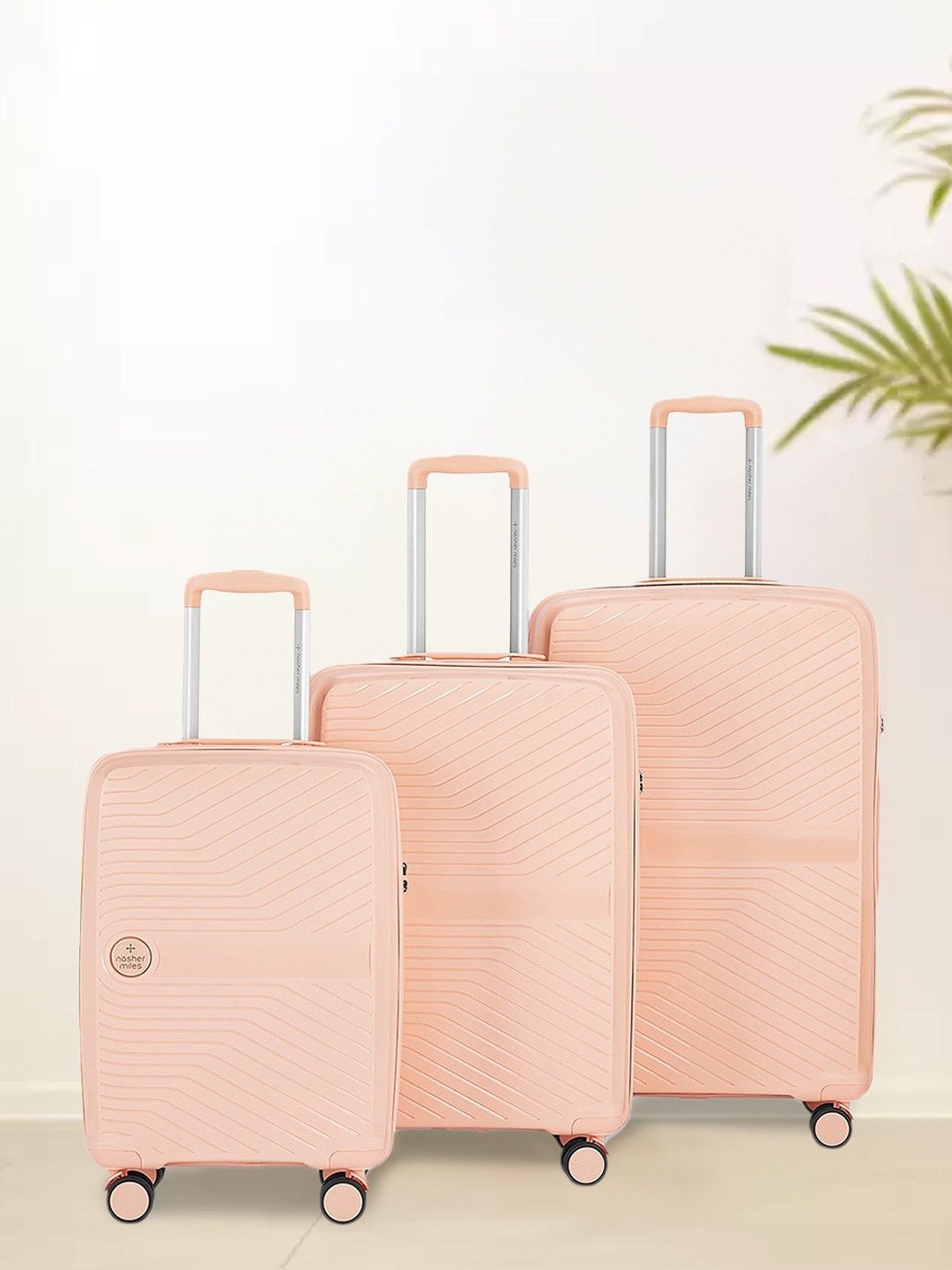 

Nasher Miles Bruges Hard-Sided Polypropylene Luggage Set of 3 Peach Trolley Bags