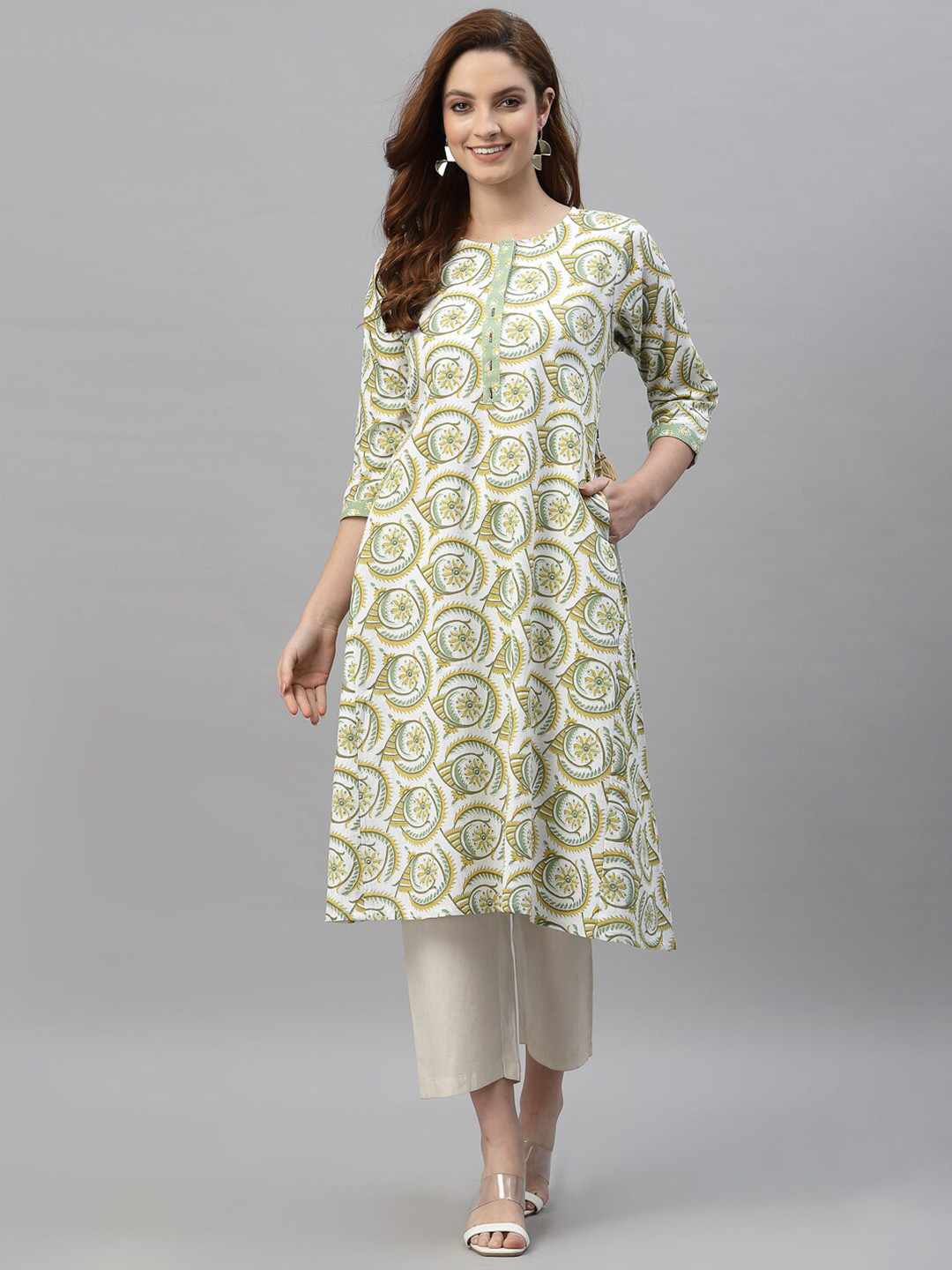 

Mode by Red Tape White & Green Printed Cotton Tunic